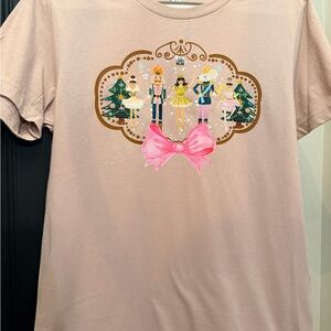 Charming Women’s Tee with Pink Bow and Nutcracker Design
